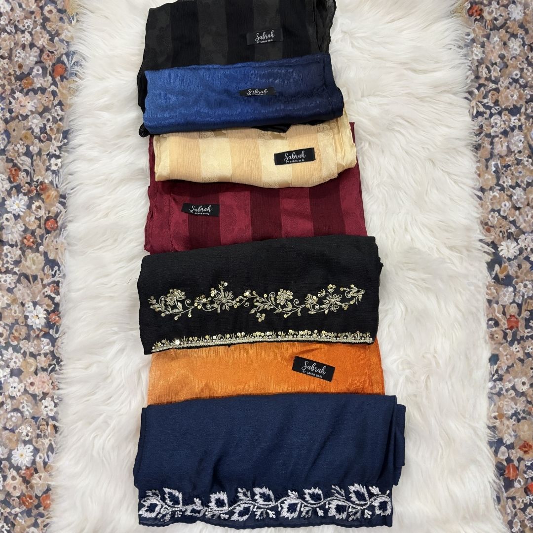 The Sabrah Ultimate Collection — Black Kora + Navy Embroidery + Royal Blue Ombré + Terracotta Ombré + Black Stripe + Maroon Stripe + Champagne Stripe | Pack of 7 | Save PKR 1,500 + Free Delivery | Luxury Hijab Collection Pakistan