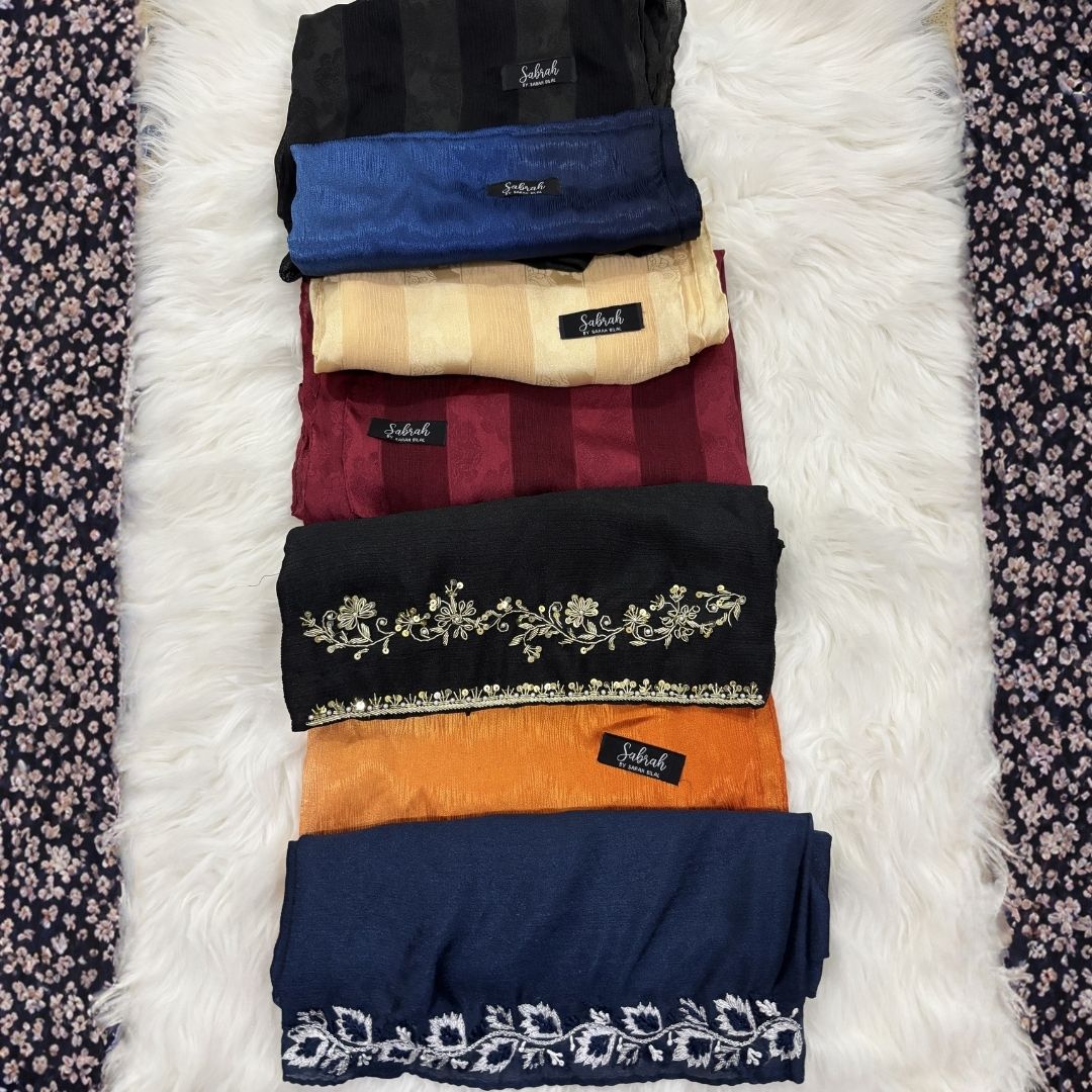 The Sabrah Ultimate Collection — Black Kora + Navy Embroidery + Royal Blue Ombré + Terracotta Ombré + Black Stripe + Maroon Stripe + Champagne Stripe | Pack of 7 | Save PKR 1,500 + Free Delivery | Luxury Hijab Collection Pakistan